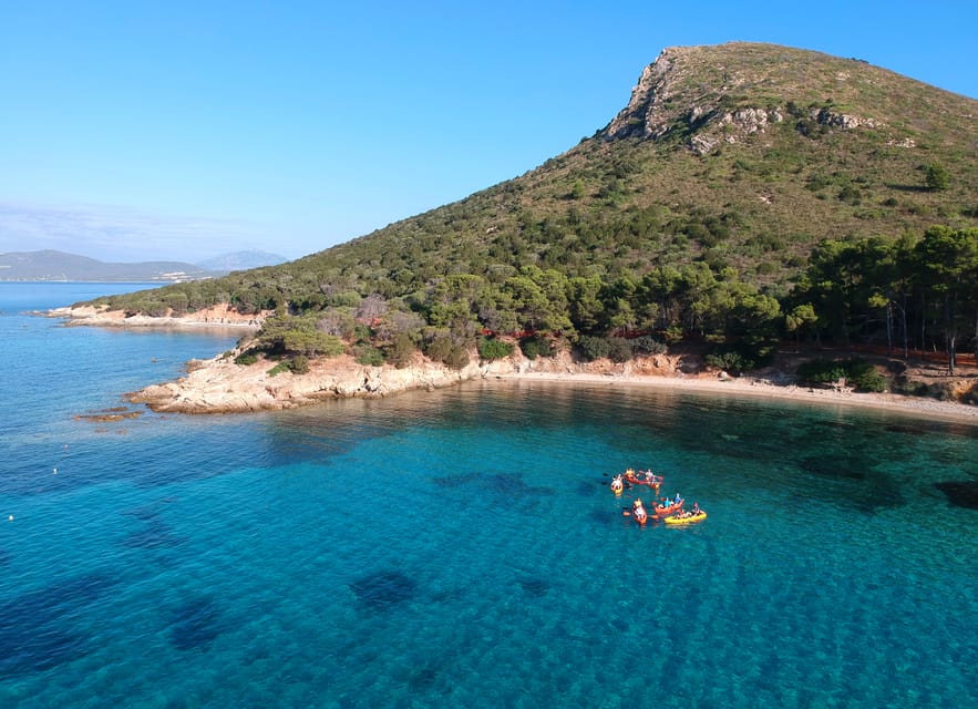 Golfo Aranci: Sunrise Dolphin Kayak Tour with Breakfast - Figarolo Island, reached from the sea