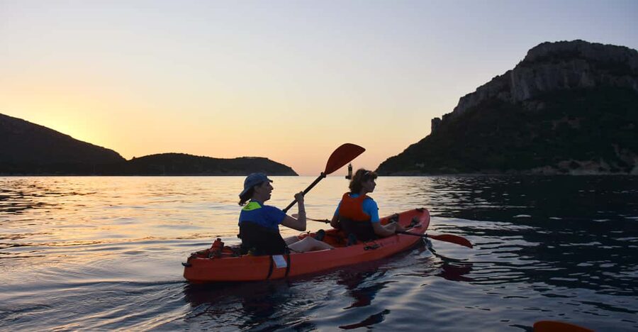 Golfo Aranci: Sunrise Dolphin Kayak Tour with Breakfast - Finding the Baracconi beach meeting point