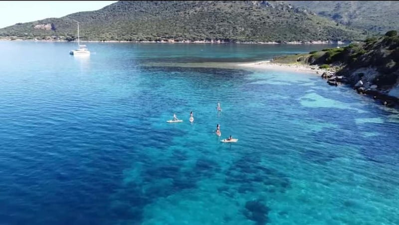 Golfo Aranci tour SUP Paddleboard Dolphin watching, aperitif - The 20-minute lesson that gets you moving
