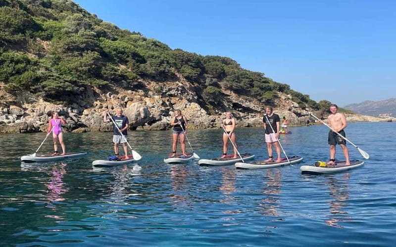 Golfo Aranci tour SUP Paddleboard Dolphin watching, aperitif - What the $68 price really covers