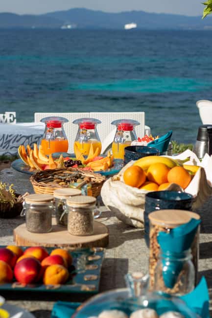 Golfo Aranci: traditional or transparent kayaks, dolphins, and aperitifs - Choosing sunrise, daytime, or sunset