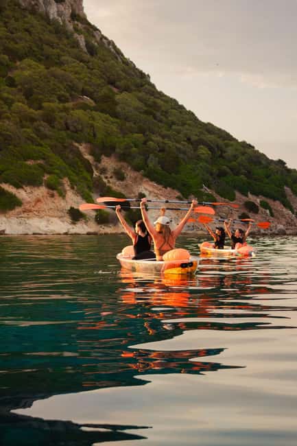Golfo Aranci: traditional or transparent kayaks, dolphins, and aperitifs - Paddling toward Cala Moresca