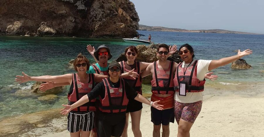 Gozo: 1 Hour Kayak plus +Cave Tour + Drop off Blue Lagoon - Entering Santa Maria Caves by boat