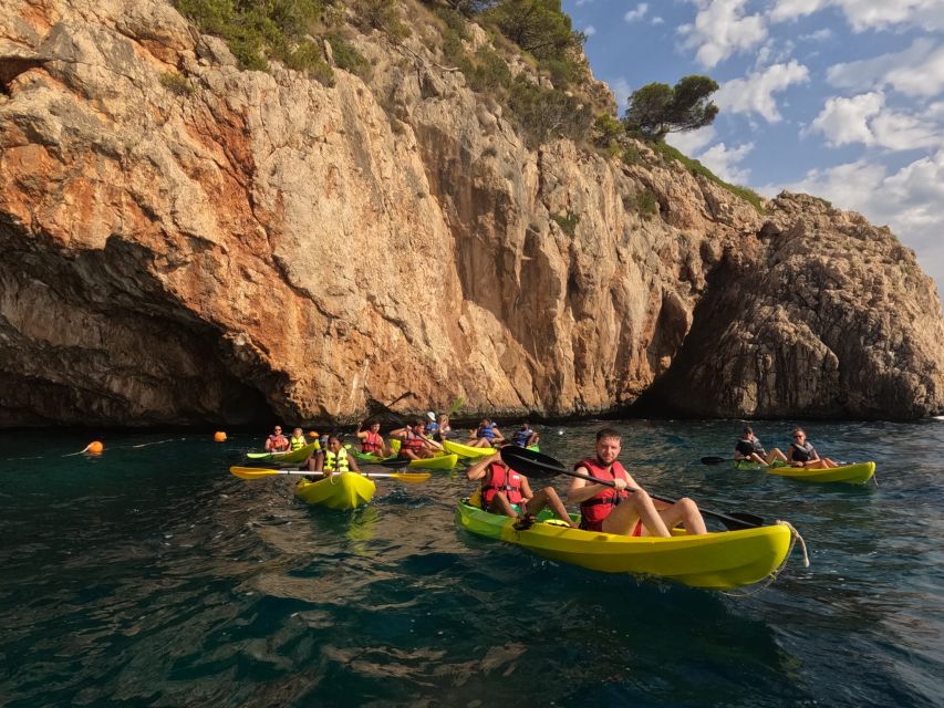 Granadella: Caló, Cova Llop Marí, and Ambolo Kayak Trip - Paddling out from Platja Granadella