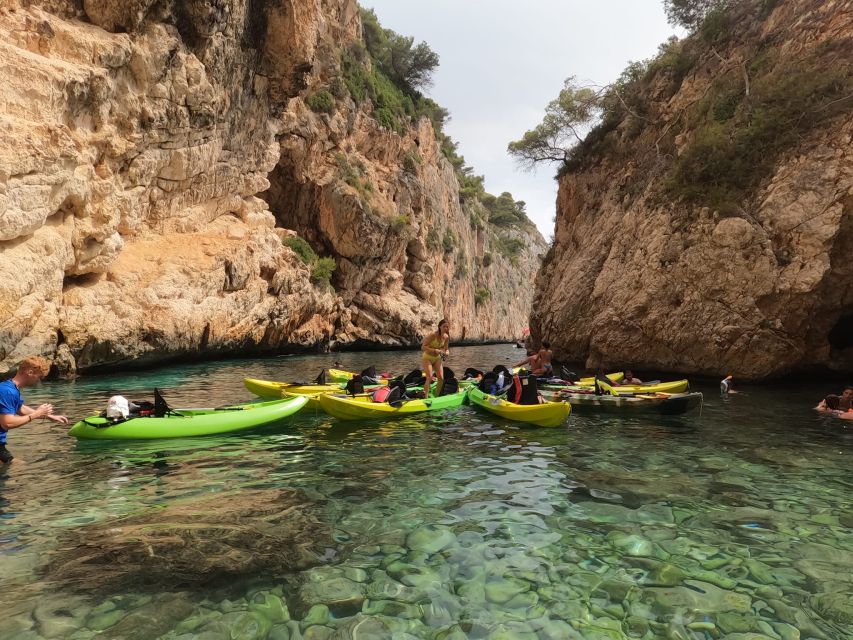 Granadella: Caló, Cova Llop Marí, and Ambolo Kayak Trip - What the $53 price covers