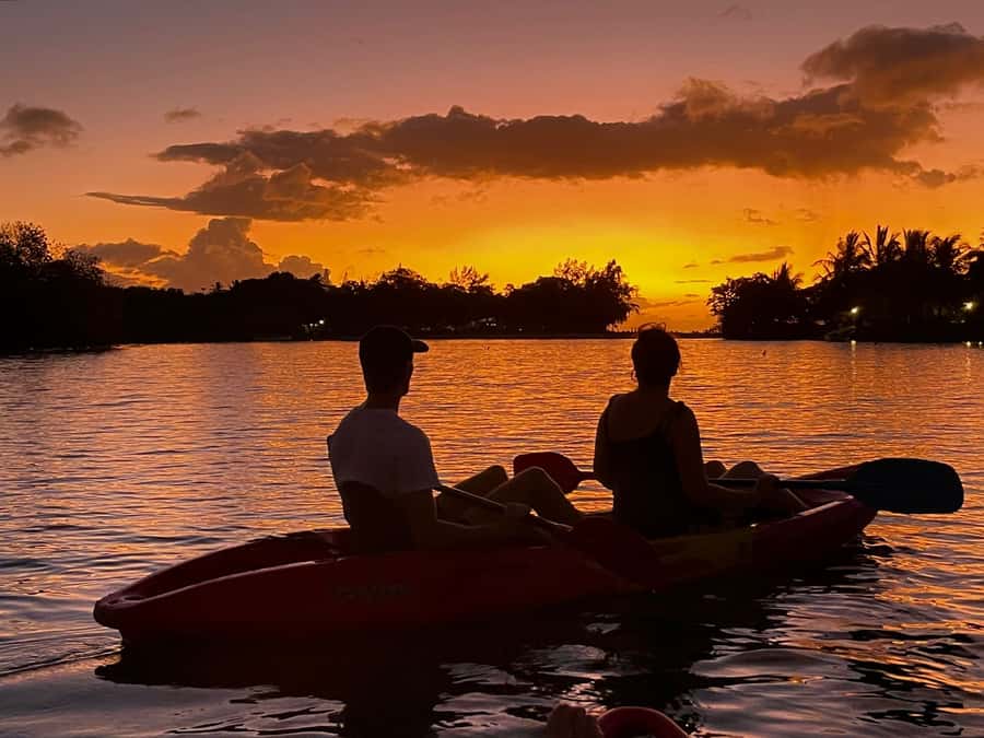 Guided Sundowner Kayak Tour - Paddling north on the Tamarin River