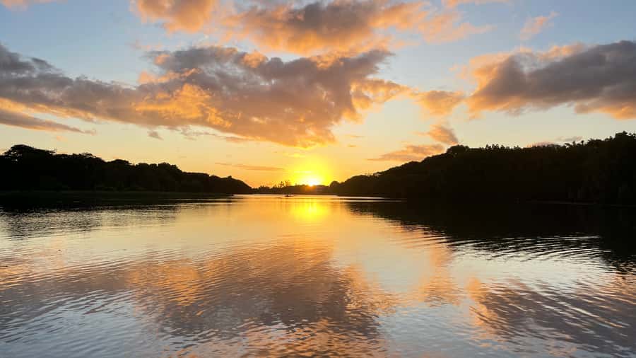 Guided Sundowner Kayak Tour - Clouds, photos, and other practical limits
