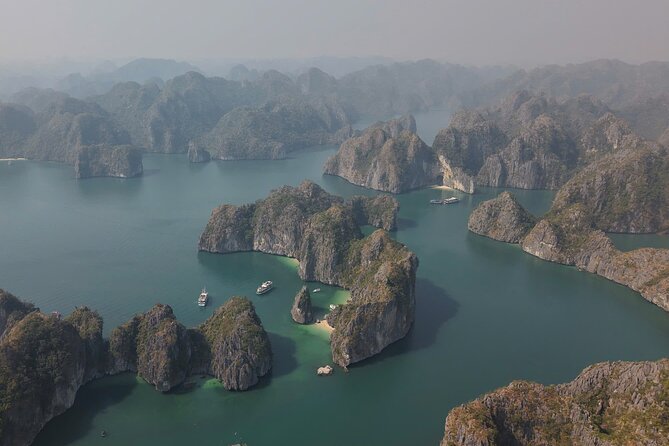 Ha Long Bay Cruise Day Tour - Cave, Kayaking, Swimming & Lunch - Kayaking or bamboo boat at Hang Luon