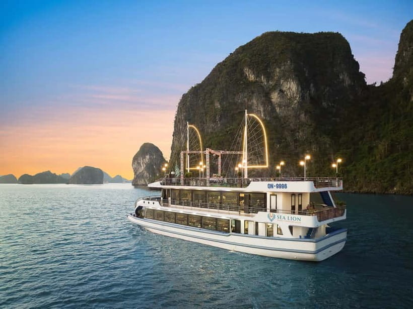 Ha Long Bay- Luxury Day Cruise, Lunch& Kayaking&Sunset party - Cruising past Fighting Cock Islets