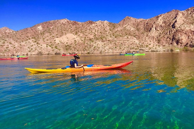Half-Day Emerald Cave Kayak Tour with Optional Hotel Pickup - What the guides add to the day