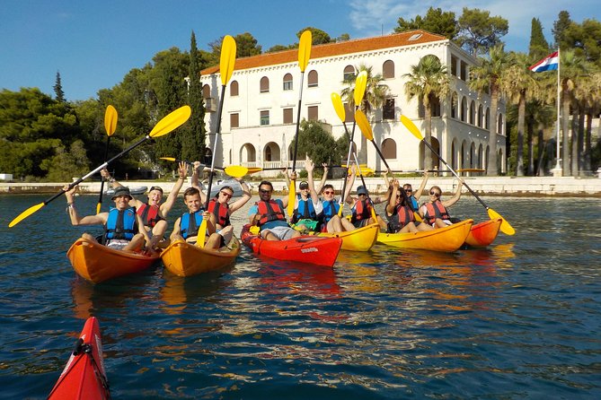 Half-Day Split Sea Kayak Adventure - Learning to kayak before the coastline opens up