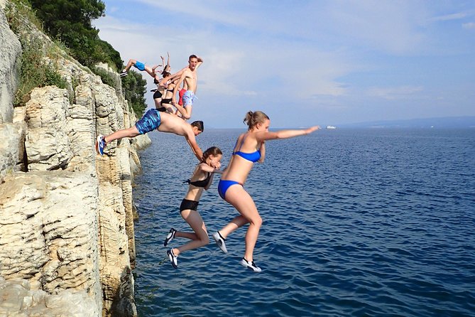 Half-Day Split Sea Kayak Adventure - Cliff jumping with a choice of height