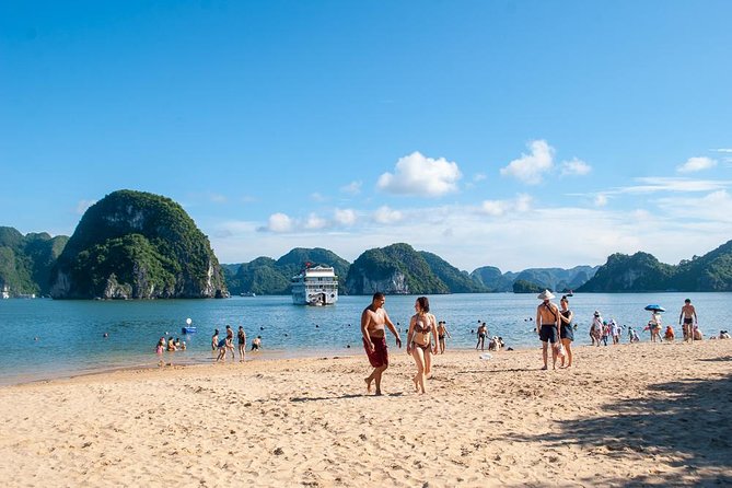 Halong Bay Day Tour With Titop Island, Cave, Kayak & Lunch - Kayaking or bamboo boat at Luon Cave