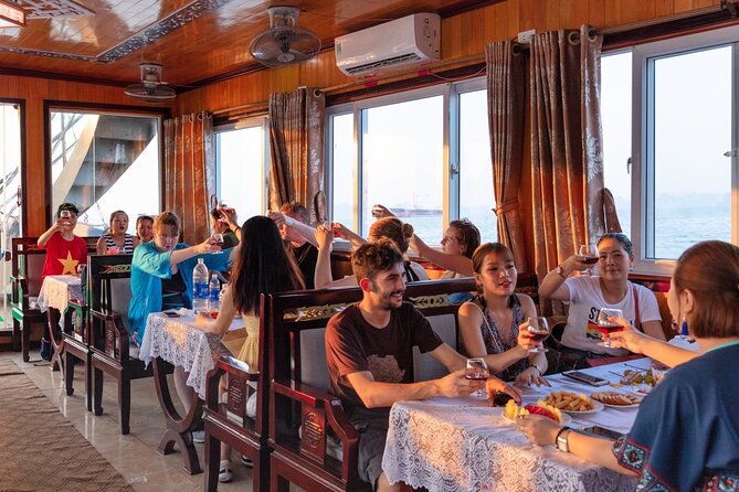 Halong Bay Day Tour With Titop Island, Cave, Kayak & Lunch - Titop Island and the 400-step climb