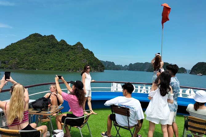 Halong Bay Day Tour With Titop Island, Cave, Kayak & Lunch - Guides, organization, and the group experience
