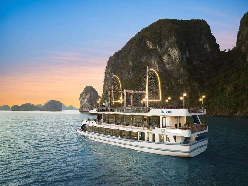 Halong Bay Luxury Cruise: Kayak&Swim,Cave, Party BEST SELLER - Sunset snacks, music, and the ride back