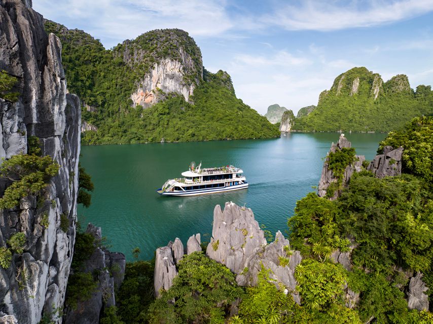 Halong Bay Luxury Cruise with Kayaking & Lunch Buffet - Sunset party with tea, fruit, and cake