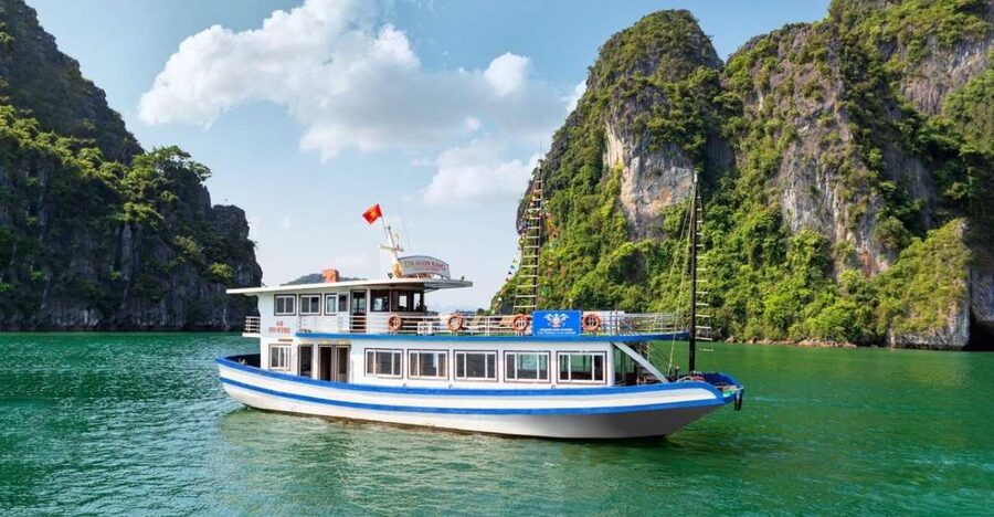 Hanoi: Halong Bay Day Trip with Titop Island, Cave, & Kayak - Sung Sot Cave and its dramatic formations