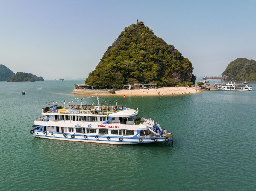 Hanoi: Halong Bay Day Trip with Titop Island, Cave, & Kayak - Titop Island, steps, views, and swimming