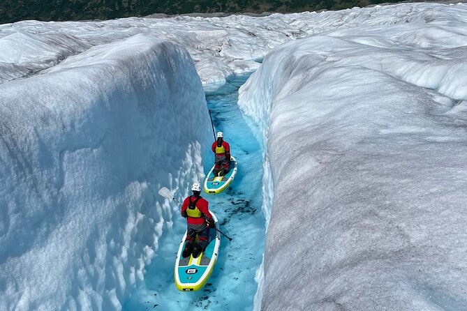 Helicopter and Glacier Paddle Boarding -PRIVATE - Landing on the glacier with the right gear