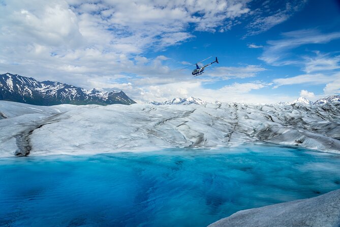 Helicopter and Glacier Paddle Boarding -PRIVATE - Paddle boarding through meltwater and ice