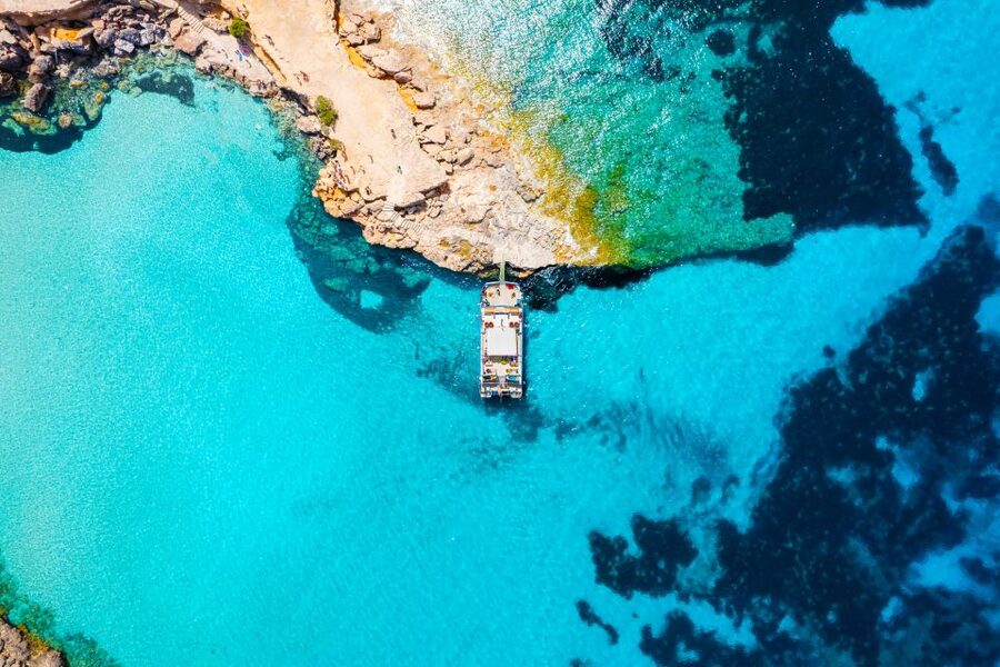 Ibiza: Beach Hopping Cruise w/ Paddleboard, Food, & Drinks - Cala Bassa: Your First Proper Beach Stop