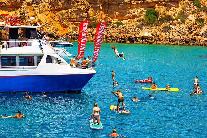 Ibiza Beach Hopping Cruise with Paddleboards, Drinks and Food 6h - The swim stop is the day’s main event