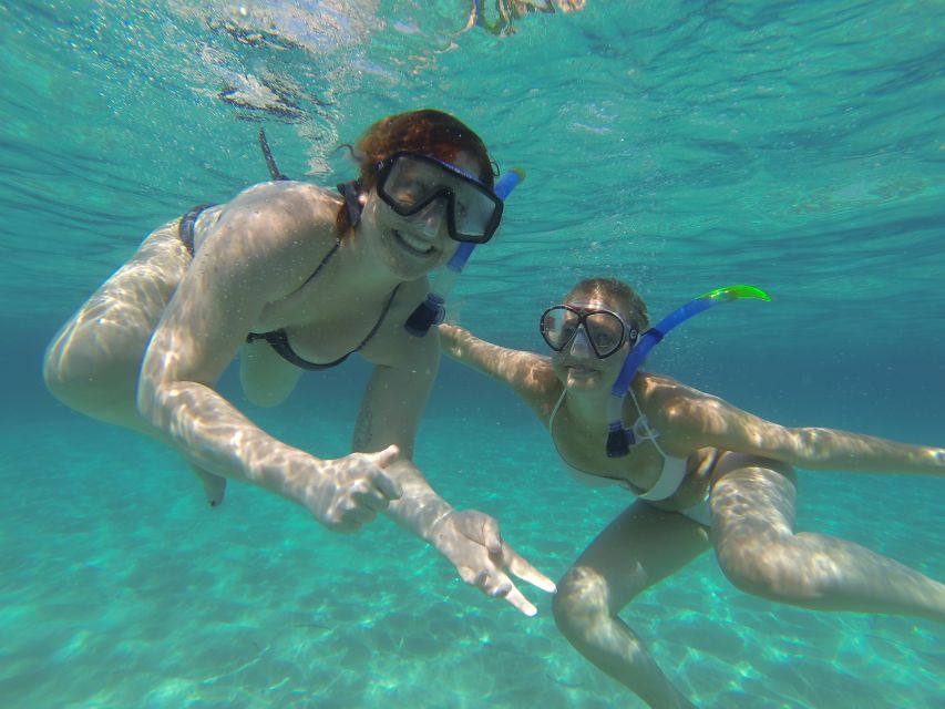 Ibiza: Snorkeling and SUP Paddle, Beach and Cave Tour - Drinks, music, and the social side of the boat