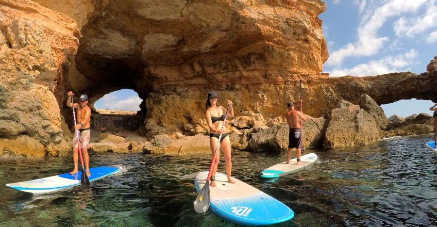 Ibiza: SUP & Snorkel Boat Tour with Caves, Drinks & Photos - Paddling past coves and sea caves