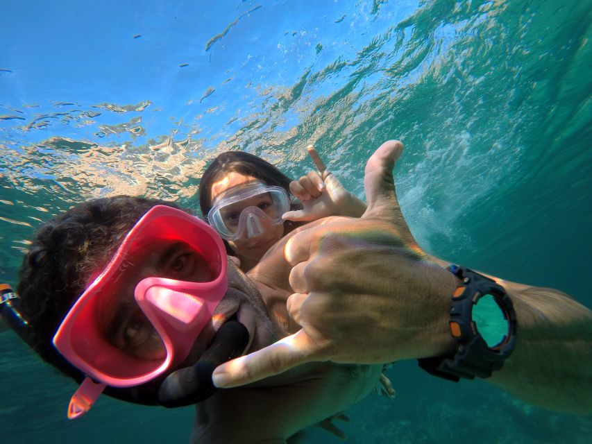 Ibiza: SUP & Snorkel Boat Tour with Caves, Drinks & Photos - What the $82 price really covers