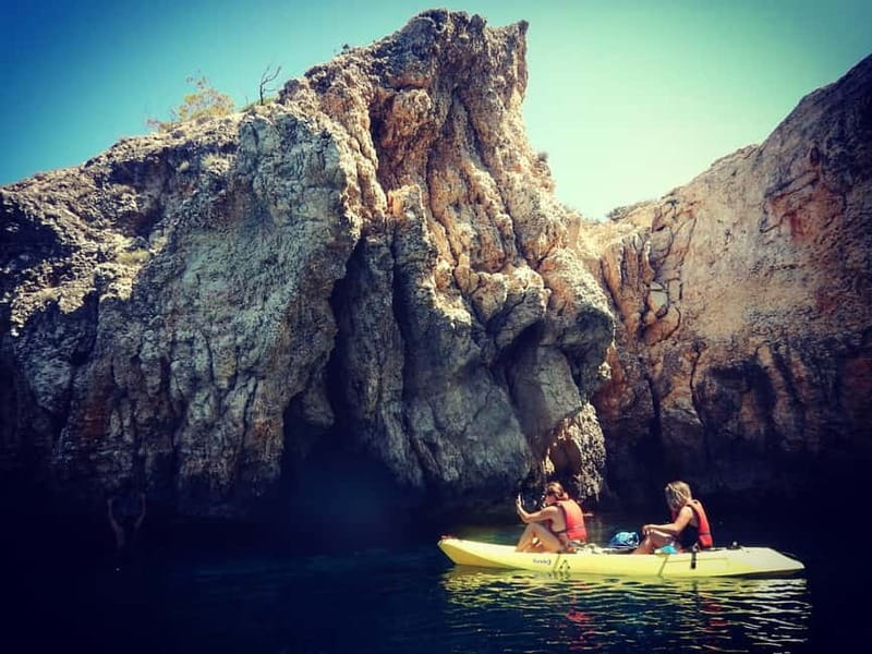 Ibiza: Xarraca Bay Guided Kayaking Tour - Snorkeling over colorful fish