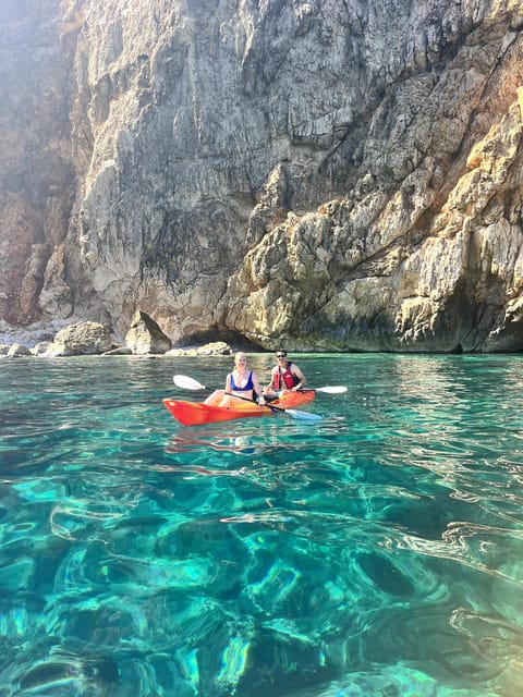 Jávea: Cala Portixol Kayak Tour with Snorkel & Cliff Jumping - Paddling below Cap Negre’s high cliffs