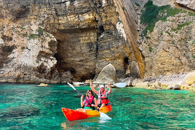 Kayak Paradise: Cala Portixol Snorkel, Cave & Cliff Jumping Tour - Isla de Portixol and its natural blue lagoon