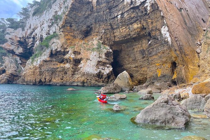 Kayak Paradise: Cala Portixol Snorkel, Cave & Cliff Jumping Tour - Booking details and cancellation terms