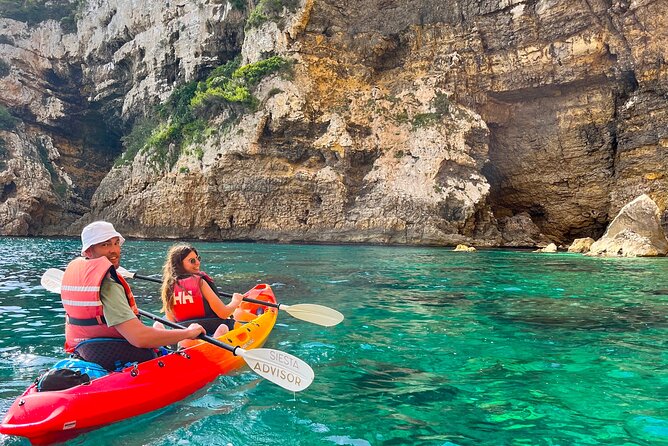 Kayak Paradise: Cala Portixol Snorkel, Cave & Cliff Jumping Tour - Cala el Pom, a quiet first reward