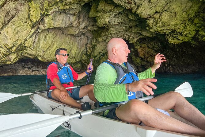 Kayak tour in Capri between caves and beaches. Photos included. - Entering Grotta dell’Acqua and a Green Grotto
