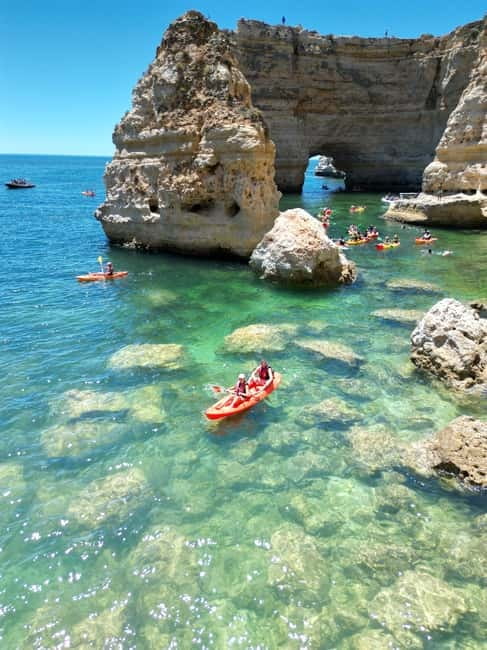 Kayak Tour Unexplored Caves + Benagil Cave - Paddling the Algarve coast in a two-person kayak