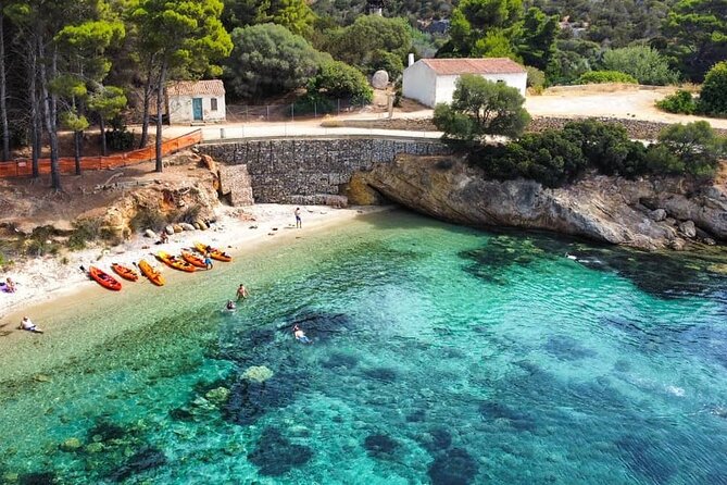 Kayak tour with aperitif and dolphins - Starting at Baracconi Beach near Golfo Aranci