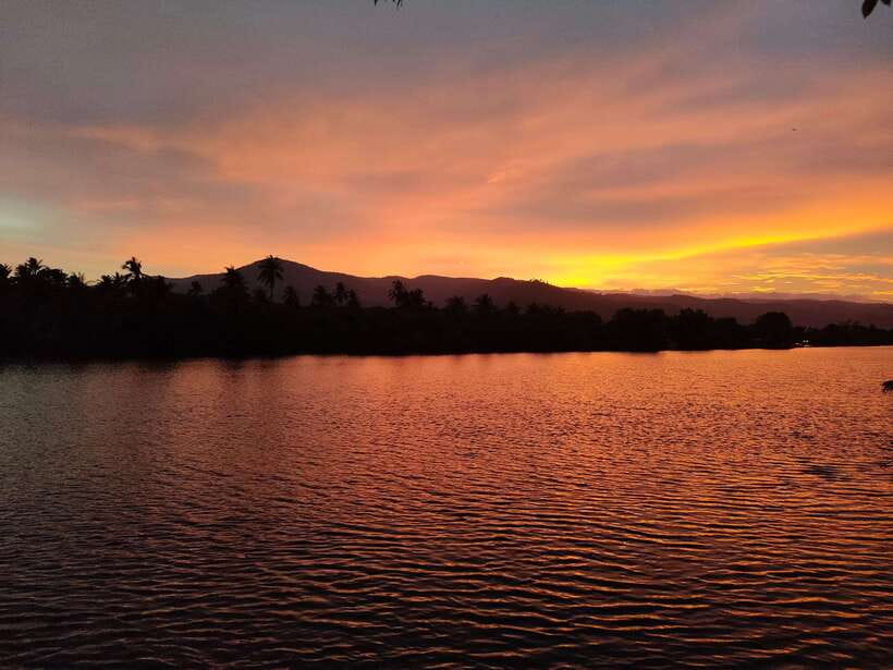 Kayaking tour around green cathedral - The swim and sunset finish