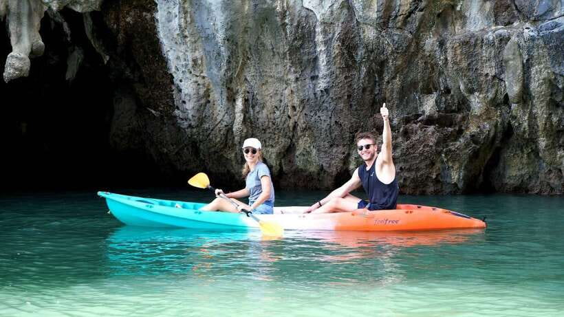 Koh Lanta: Sea Cave Kayaking and Talabeng Island Tour - Longtail boats and the crossing to Ung Island