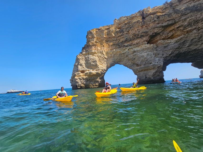 Lagoa: Benagil Cave and Marinha Beach Guided Kayaking Tour - Passing Marinha Beach and its arches