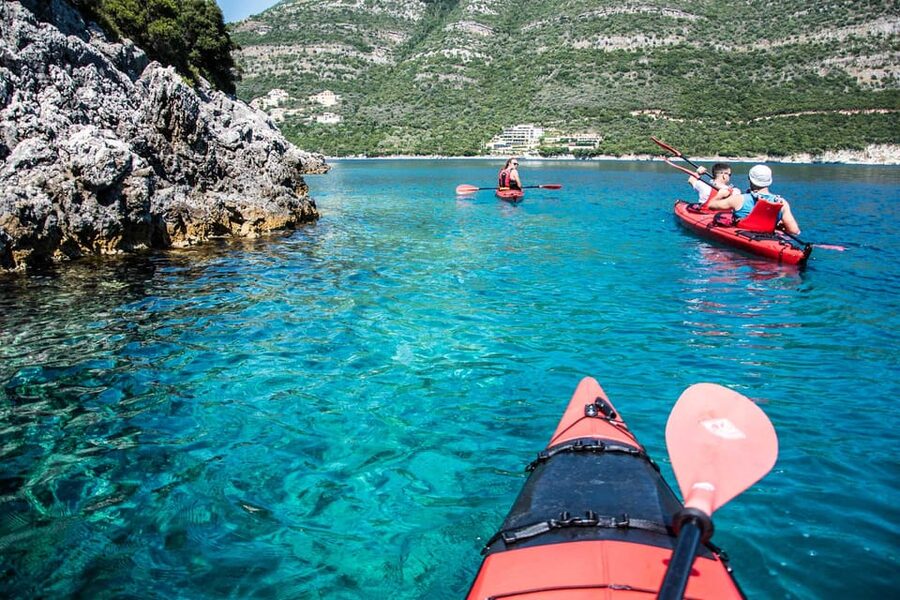 Lefkada: Blue Cave Kayak Tour with a Taste of Greece - Snorkeling over red starfish