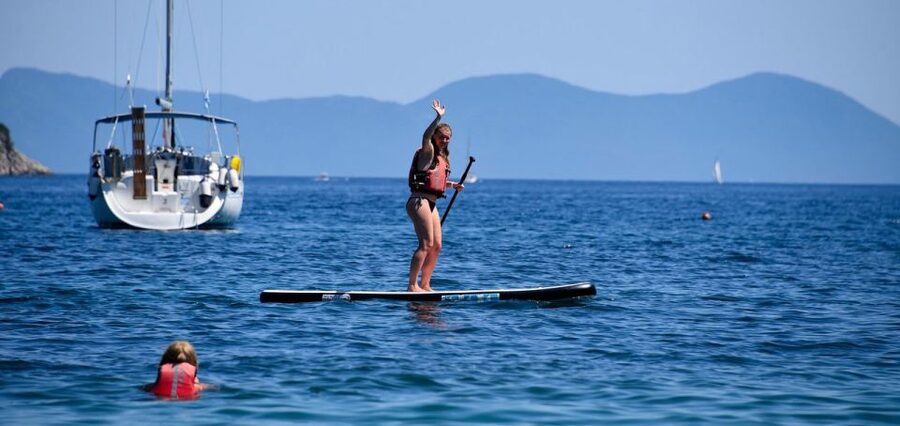 Lefkada: Guided Half-Day Island Stand-Up Paddleboarding Tour - A simple snack break on the water