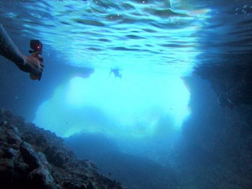 Lefkada: Hidden Blue Cave Kayak Trip with Lunch & Fruits - Paddling southeast along Lefkada’s coast