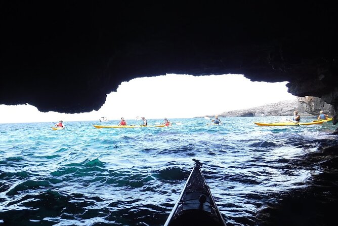 Leuca kayak tour + swimming + speleo-trek in cave - Paddling past Dragon Cave and Lovers Cave