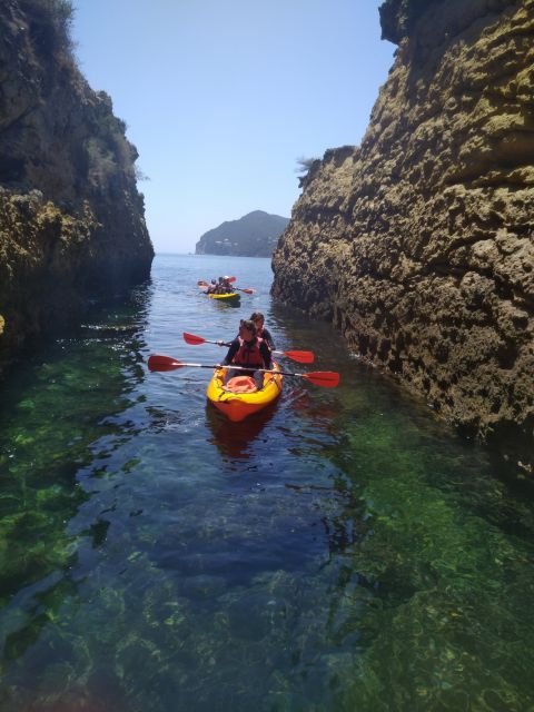 Lisbon: Arrábida Kayak and Coasteering Adventure Tour - Four hours of kayaking beside the limestone cliffs