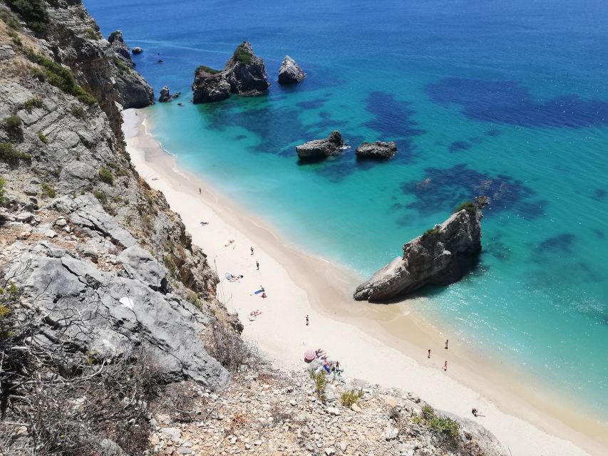 Lisbon: Full-Day Sesimbra Kayak Tour with Picnic - Ribeiro do Cavalo Beach, the day’s main reward