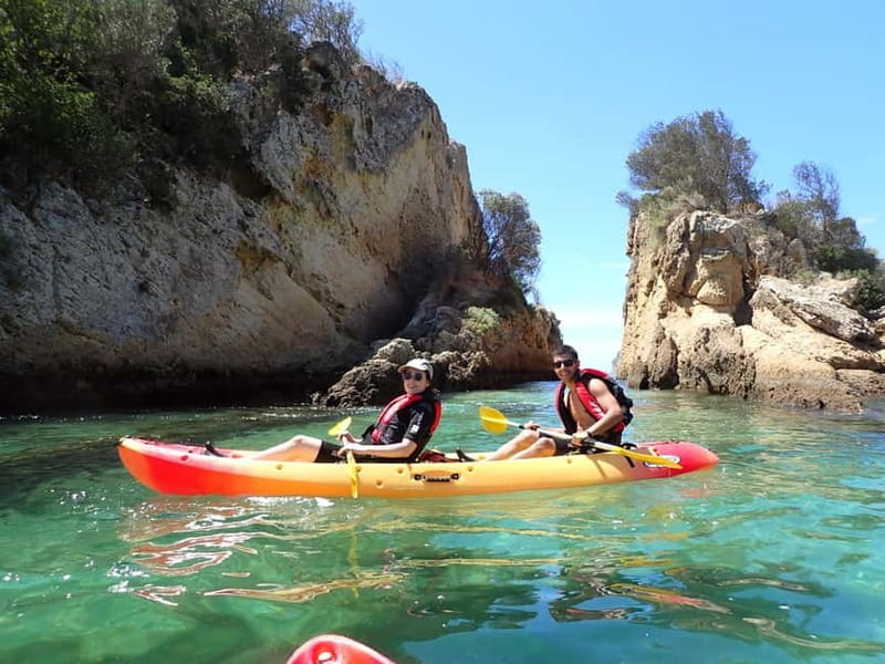 Lisbon: Kayaking & Snorkeling Tour with photos included - Paddling below Arrabida’s cliffs