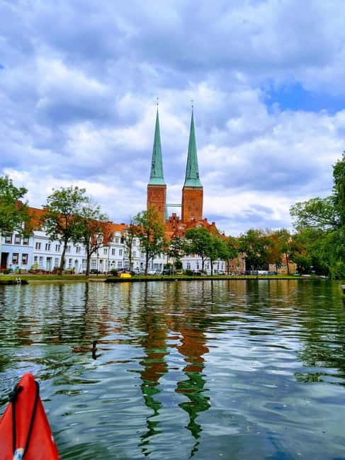 Lübeck's old town by canoe: explore and circumnavigate on your own - Passing the Holsten Gate from the water