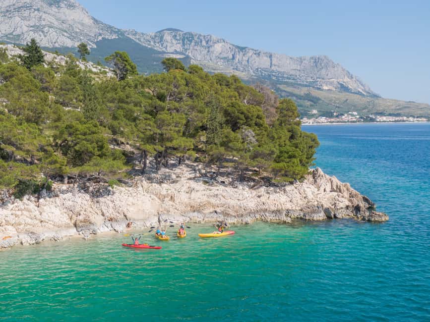 Makarska: Guided Sea Kayaking Tour with Snorkeling Stop - Paddling toward St. Peter Lighthouse